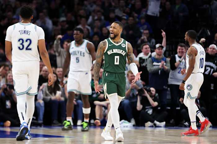 Feb 23, 2024; Minneapolis, Minnesota, USA; Milwaukee Bucks guard Damian Lillard (0) reacts during the first half against the Minnesota Timberwolves at Target Center.